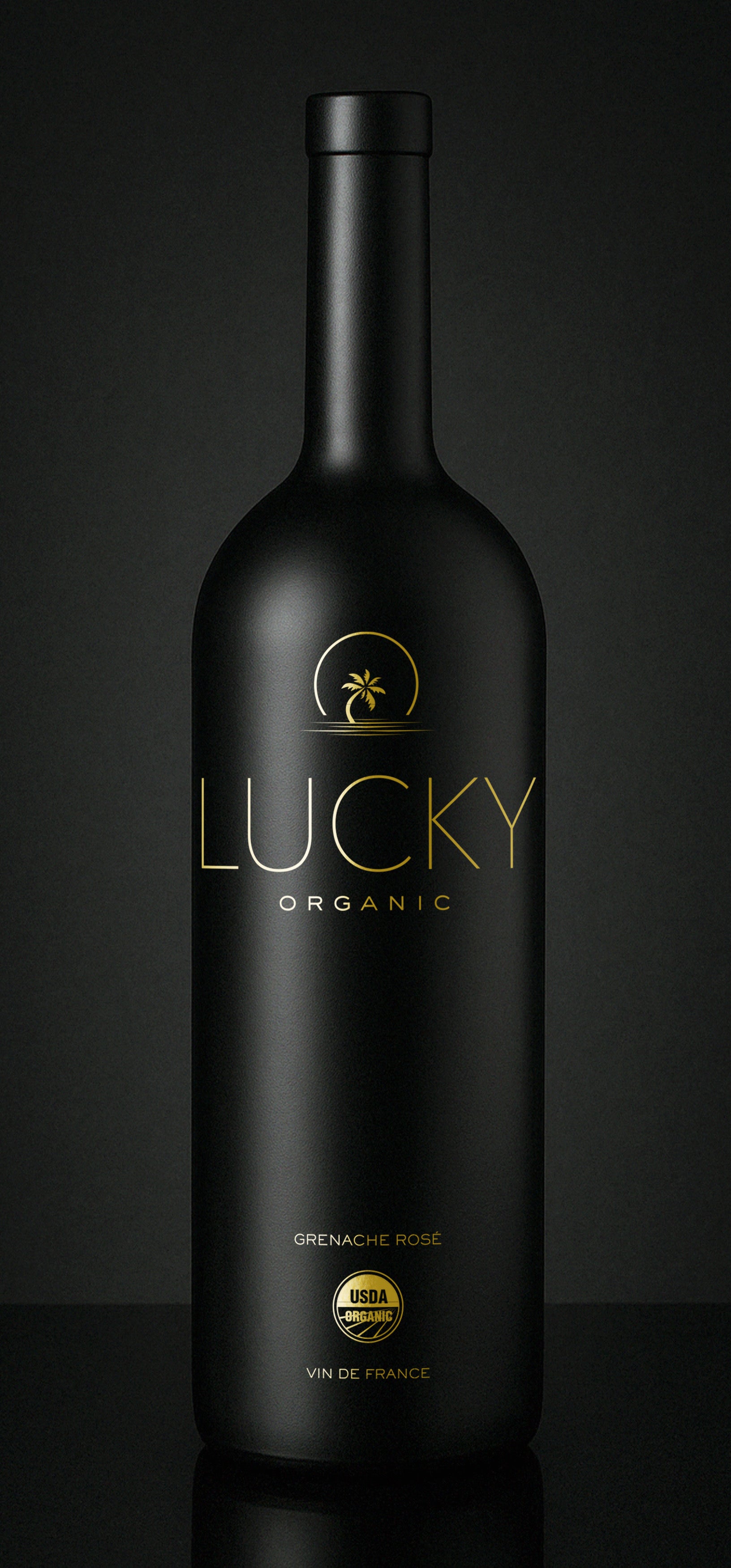 Black wine bottle with 'Lucky Organic' branding on a dark background